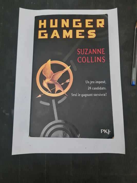 Hunger games , Suzanne Collins