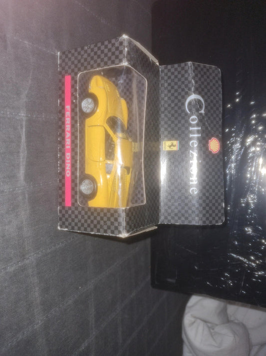 Ferrari Dino jaune 1/43 shell collezione